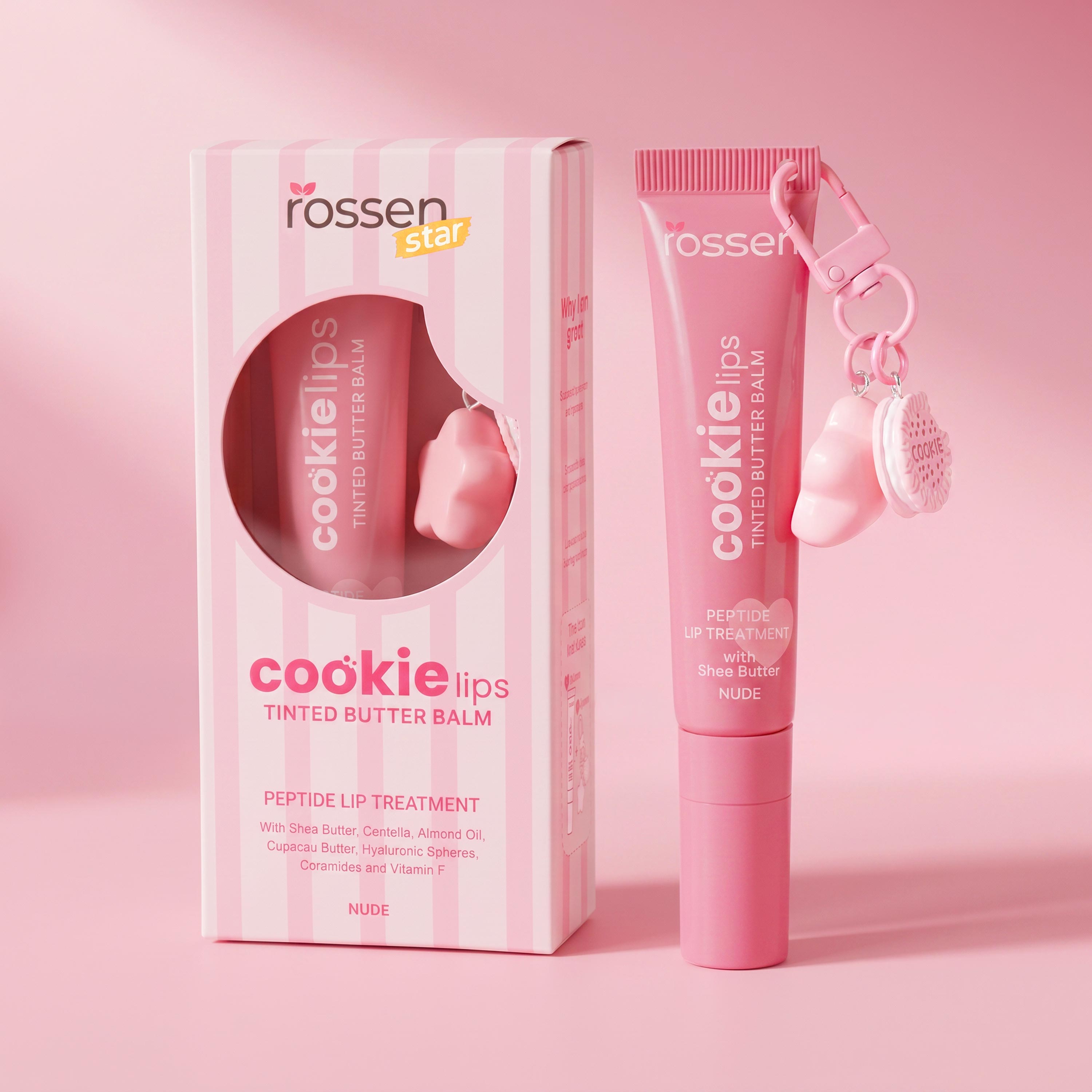Pink product box and matching pink lip care tubes labeled "cookie lips" on a pink background, showing tinted butter balm and lip treatment set.